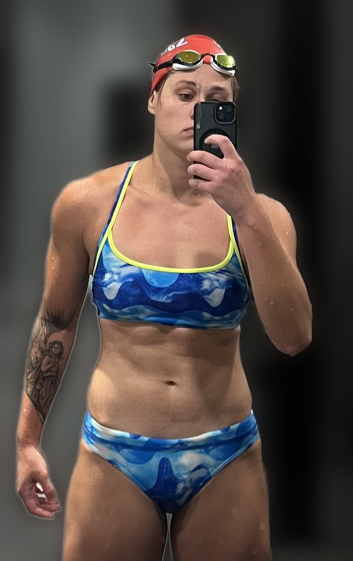 Maria Rezhylo in cap and goggles on the pool deck
